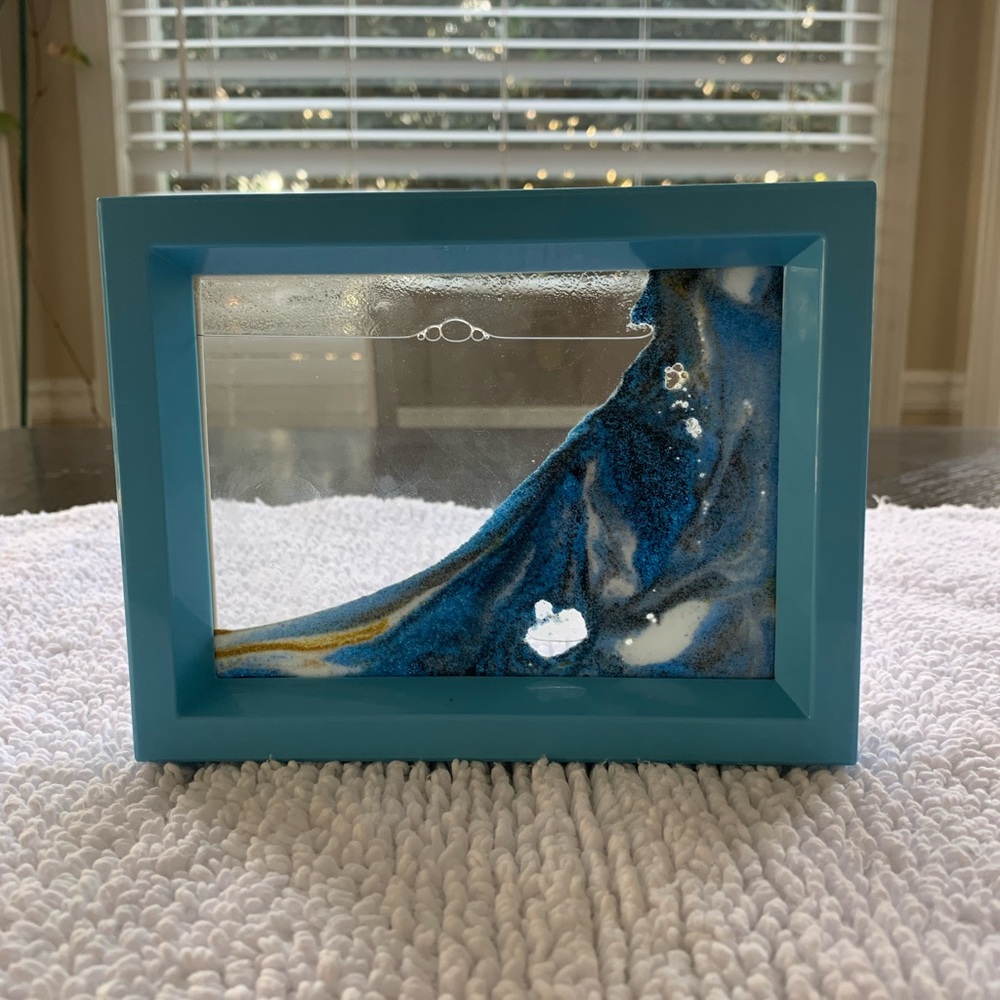Blue moving sand art picture